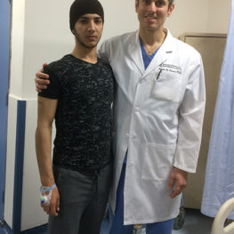 Dr. Kurtom with a patient post-surgery
